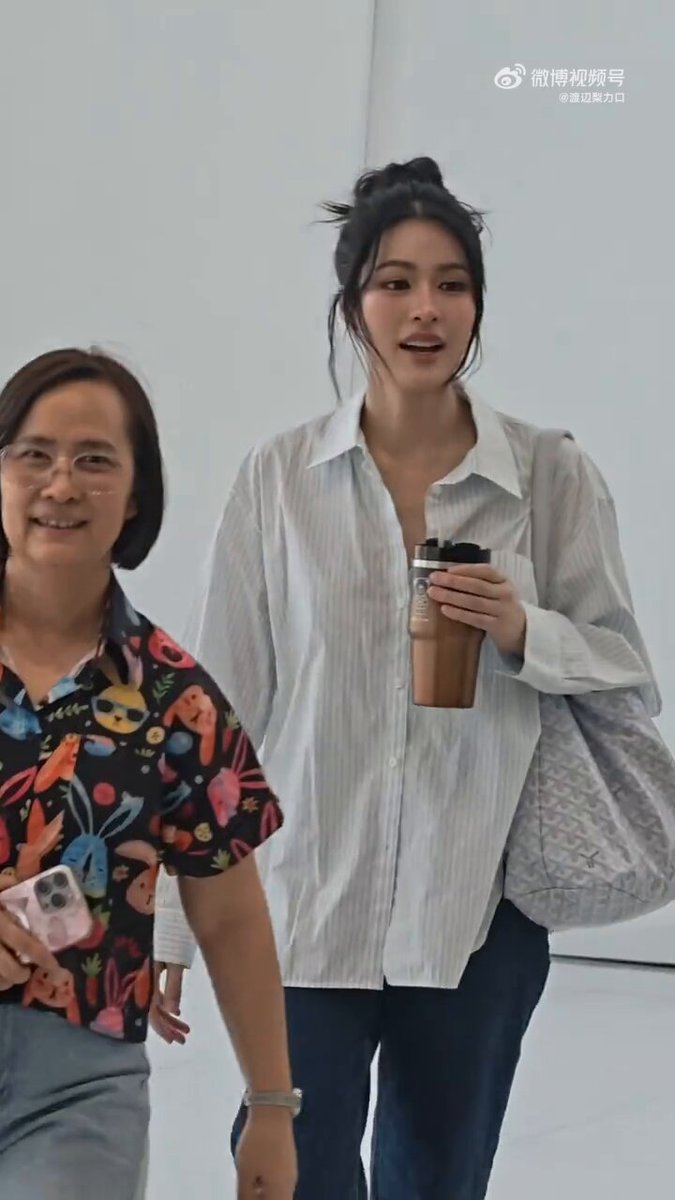LINGLING IN A HALF UNBUTTONED COLLARED SHIRT WITH HER HAIR LIKE THAT WILL BE THE DEATH OF ME LINGORM THAICONIC ICONSIAM #LingOrmxsongkranICONSIAM