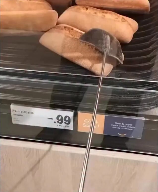 The way a supermarket bread slicer works...