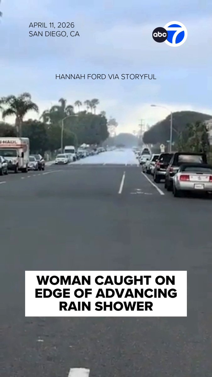 LIKE "SCI-FI!" A woman was astonished to find herself right at the edge of an advancing rain shower. 😳🌧️ She caught the moment she was standing perfectly dry in front of the oncoming downpour before being drenched by the shower.