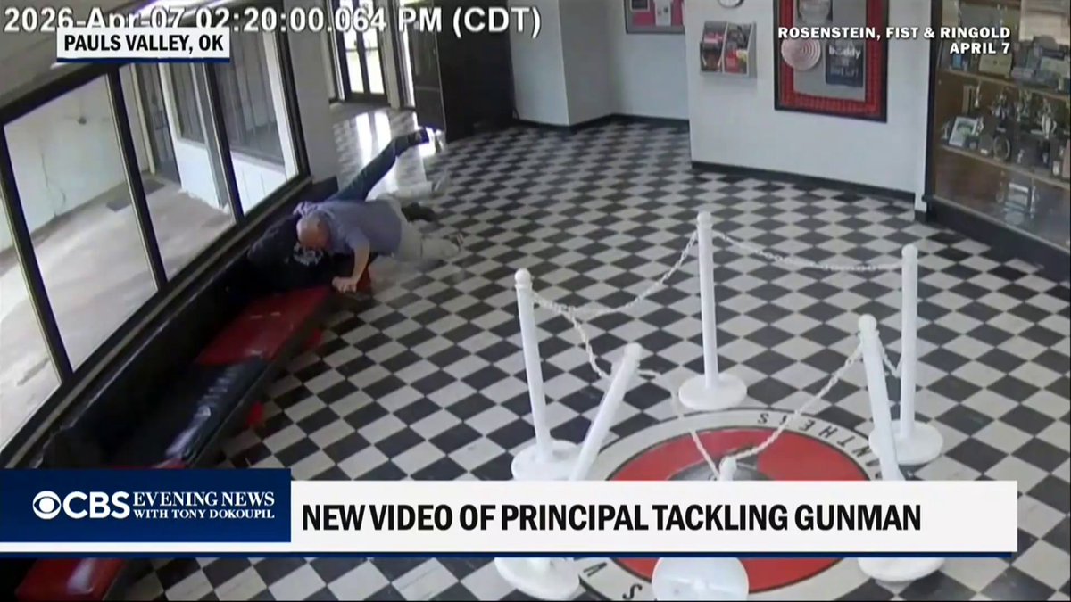 The principal of Pauls Valley High School in Oklahoma rushed from his office and, despite being shot in the leg, tackled a gunman. No one else was hurt.