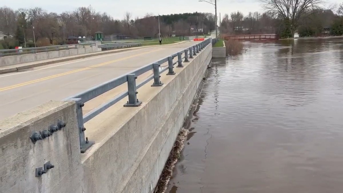 Water is beginning to hit the bridge on Maple Island Road in Hesperia, and the dam just upstream is at risk of failing due to high water levels. A flash flood watch remains in effect for downstream areas of the White River.