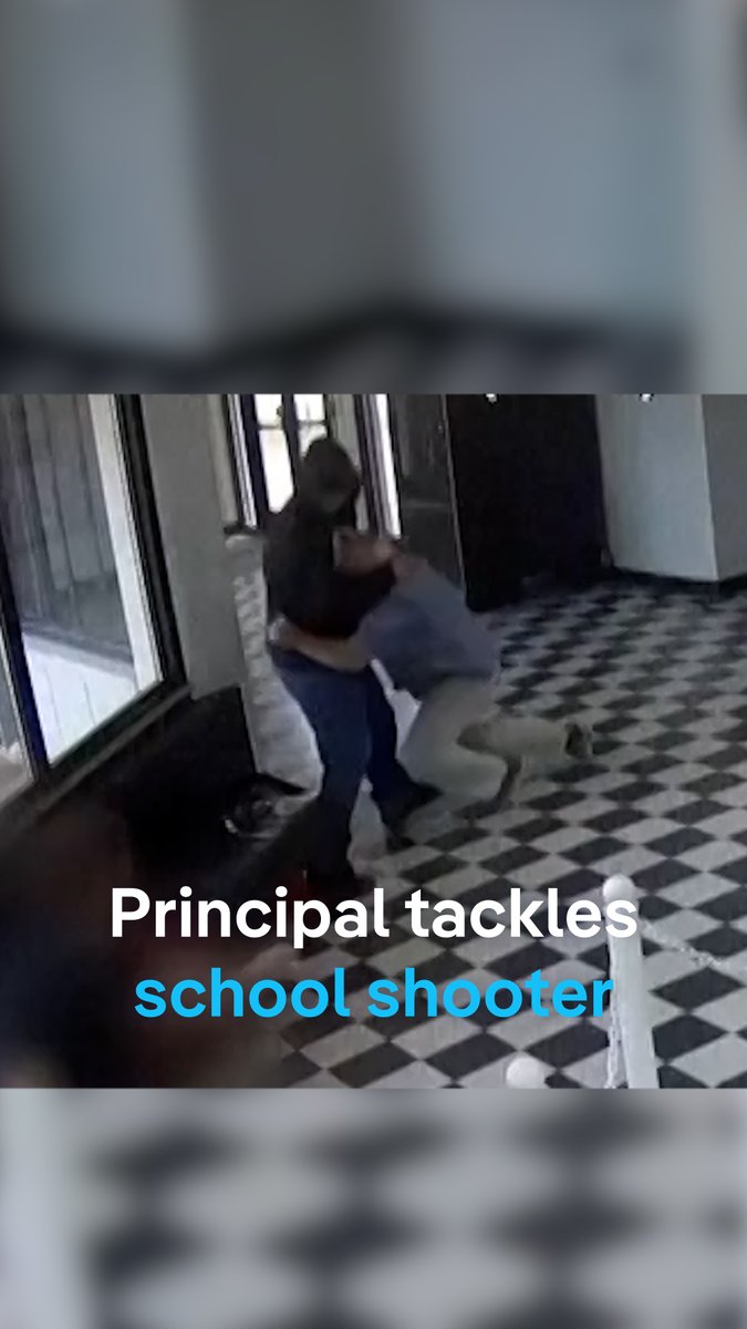 See the moment a principal in the US tackles an armed former student