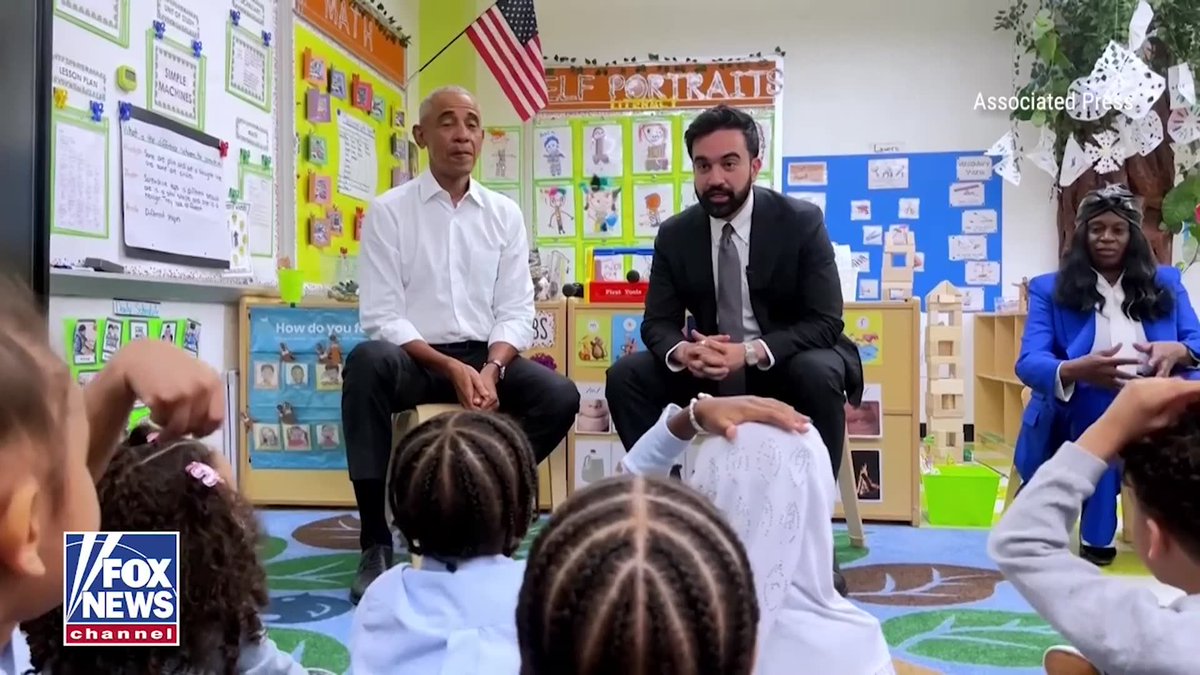 Former President Obama and Mayor Mamdani sing "The Wheels on the Bus" with children during their first joint appearance together.