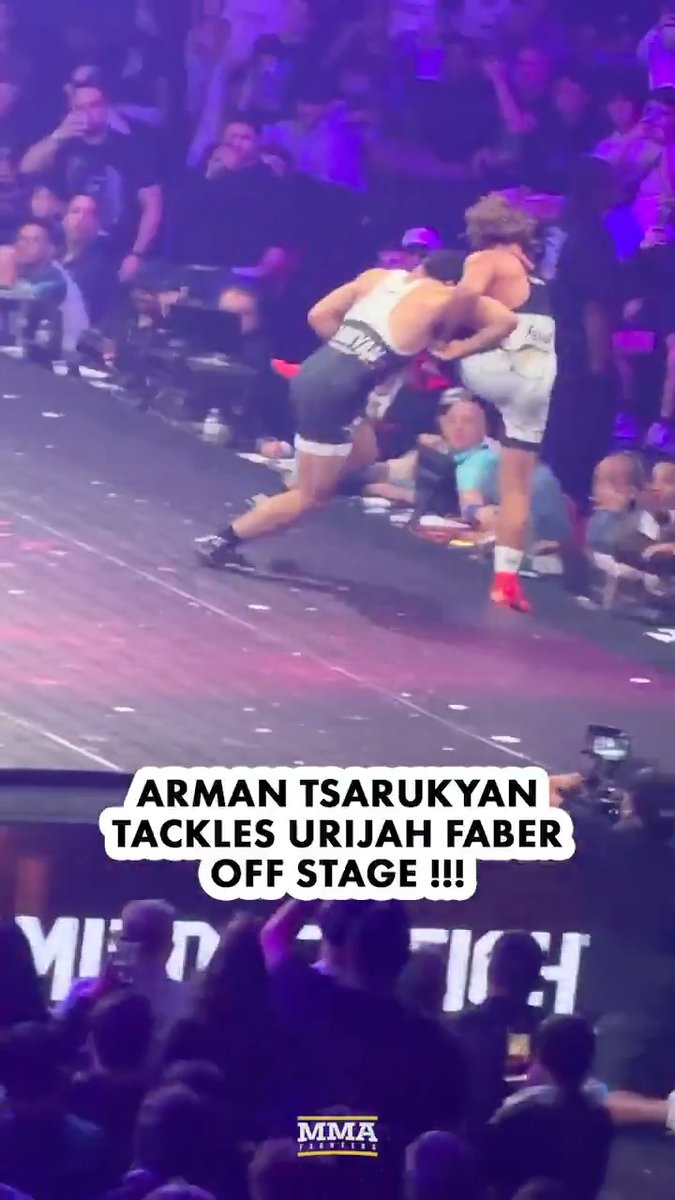 Arman Tsarukyan just tackled Urijah Faber off the stage during their wrestling match at RAF 08! (🎥: @mikeHeck_JR)