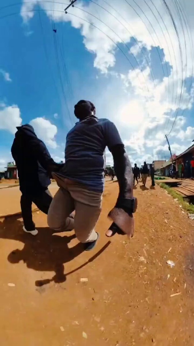 This photographer was arrested in Githunguri, Kiambu County, and labeled a goon. The police who assaulted him later reached out to him and offered to compensate him after he was found innocent. The police realized he had footage of them harassing him.