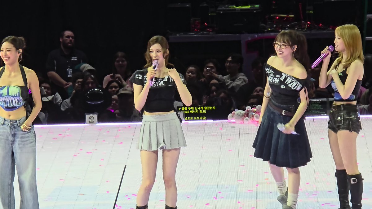 TWICE's reactions to the American SaNayeon kiss flag, Nayeon saying that it's photoshopped. When it showed up on the big screen everyone screamed and she asked "Why do you like it so much?" 😭