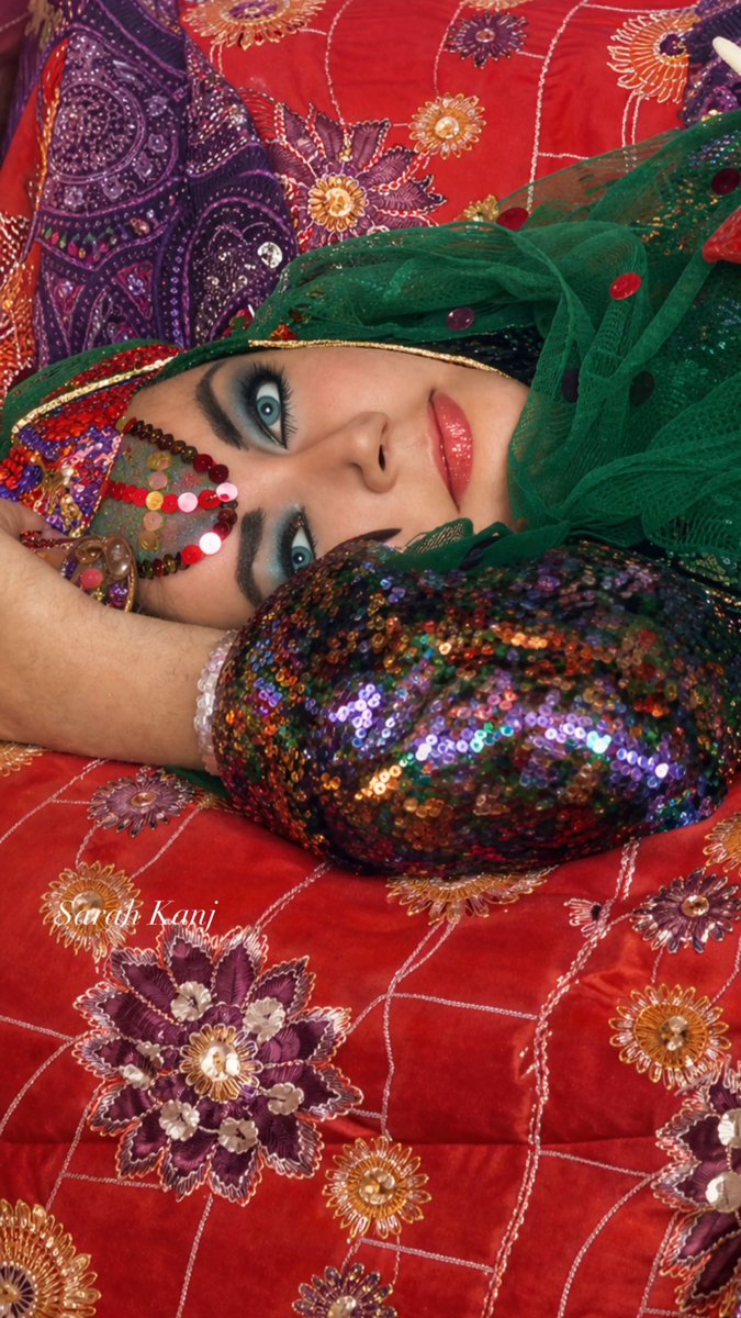 In 1976, Elizabeth Taylor spent weeks traveling through Iran — Persepolis, Shiraz, Isfahan, Tehran. She shopped in bazaars, visited poets’ tombs, wandered historic sites, and ended up inaugurating Iran Air’s first Tehran–London flight.