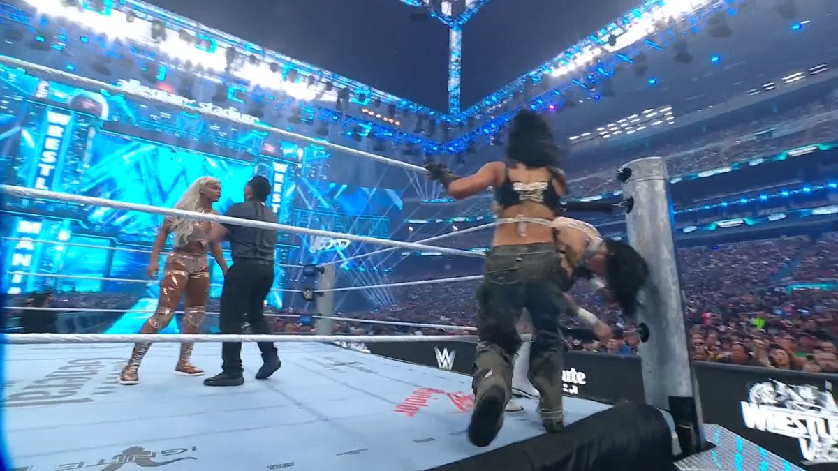 OH COME ON! 😡 A 3 on 1 attack on RheaRipley_WWE! Stream #WrestleMania LIVE RIGHT NOW on the ESPN app! ➡️