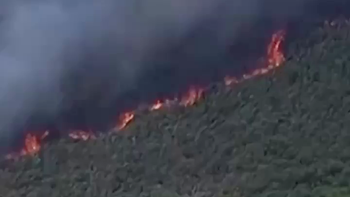 Wildfires are burning thousands of acres across Florida amid a severe drought, while in northern Michigan, historic flooding is sending large ice chunks into homes.