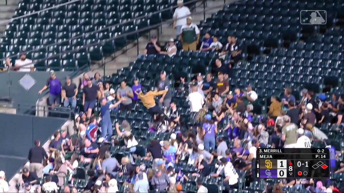 This fan might've made the catch of the year at Padres-Rockies last night 🤯
