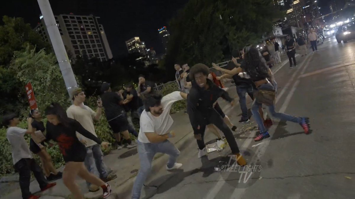 All out brawl breaks out Downtown ATX #fight #texas
