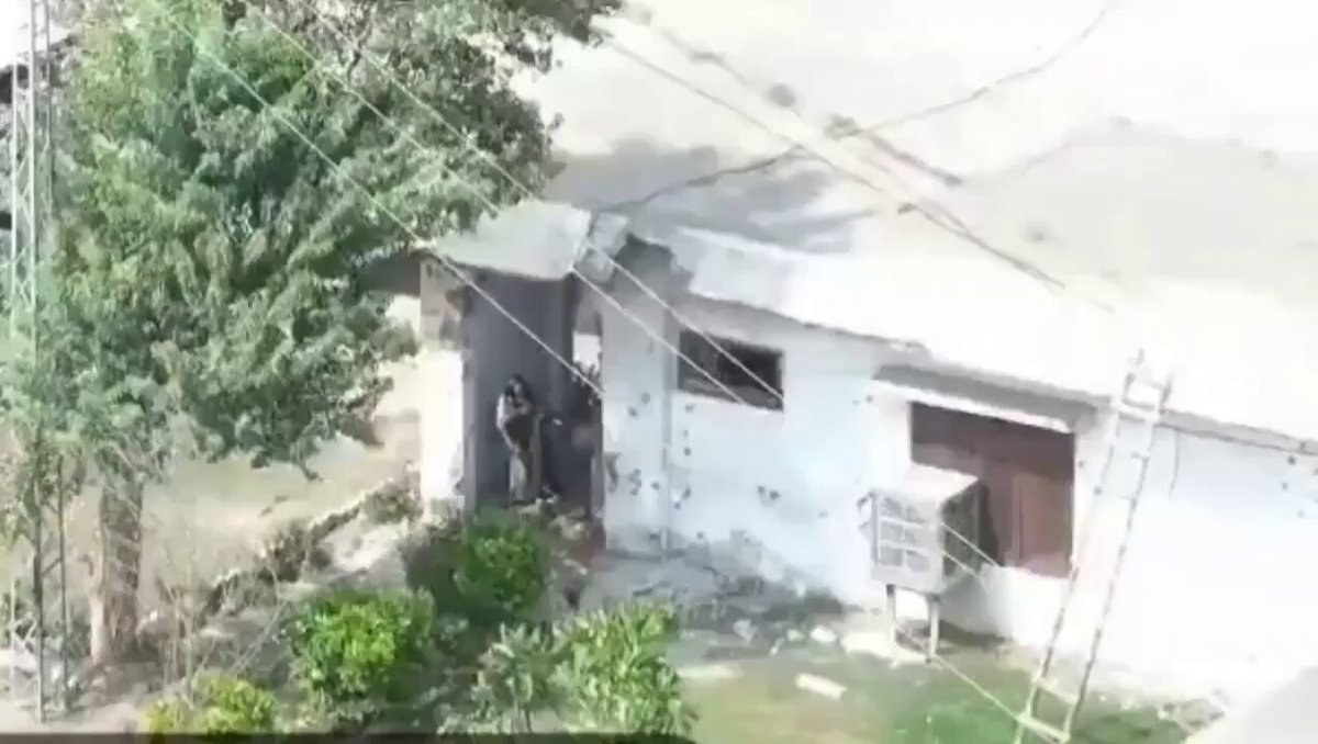 Drone footage showing intense Close Quarter Combat between an TTP and operators of the SSG's 5th Battalion during a clearance operation at a Paramiliatary base in Bannu city of Pakistan