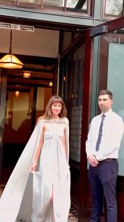Dakota Johnson knows how to make an entrance - and an exit! The actress looked breathtaking in Valentino as she left her New York hotel for the TIME100 gala - pausing to flash a sweet smile at a female photographer who complimented her before she slipped into her car 💗 #dakotajohnson 📽️: Getty
