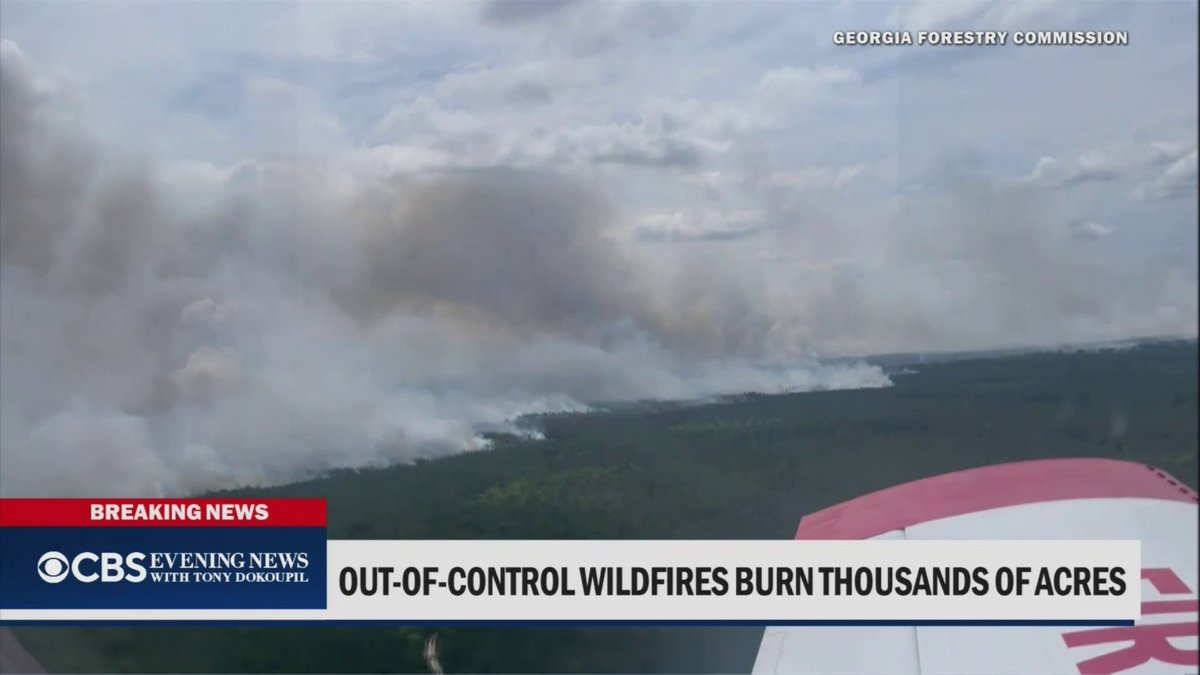 Hundreds have been forced to evacuate as wildfires continue burning across thousands of acres in Georgia and Florida, with officials saying “it’s a miracle” no lives have been lost.