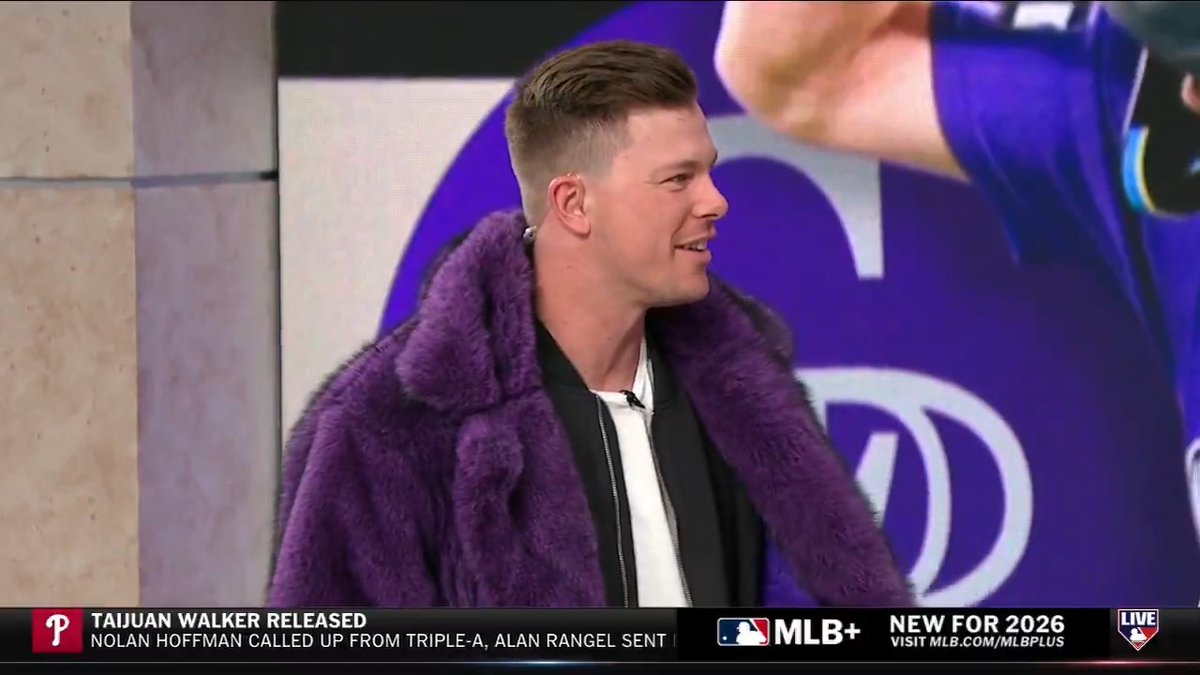 Troy Johnston brought the Colorado Rockies' "Homer Coat" to Studio 21! 🟣🧥 "It smells like homers." 🤣
