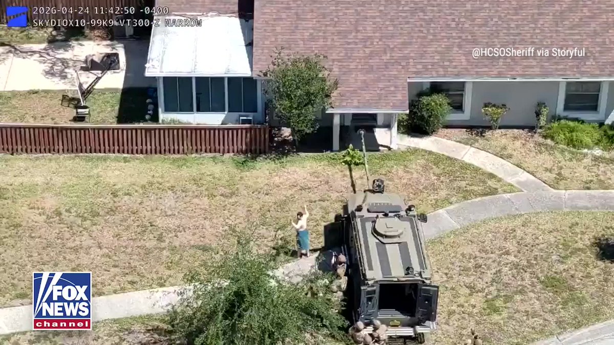 Man with a missing roommate emerges from a home after barricading himself following a domestic violence call, officials say. The sheriff's office says the roommate's body was found near a bridge, and Hisham Abugharbieh, 26, is facing charges of unlawfully holding or moving a dead human body in unapproved conditions, failure to report a death to a medical examiner or law enforcement, tampering with physical evidence, false imprisonment and battery.
