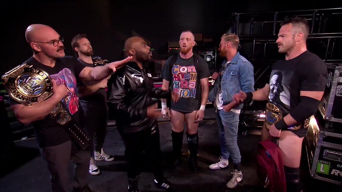 Orange Cassidy got Roderick Strong his own OC style shirt, besides the Conglomeration backpacks. 🎒❤️
