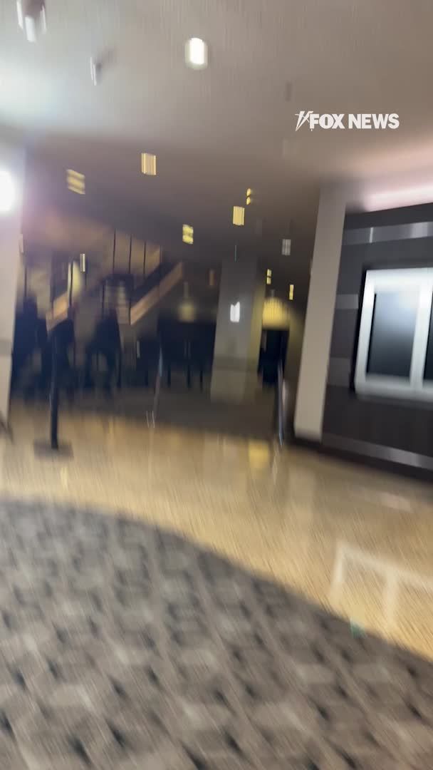 🚨BREAKING: Dramatic new video shows law enforcement with guns drawn searching for the shooter and yelling “We have one down" as panic and confusion erupted after gunshots were heard at the White House Correspondents’ Dinner. | Gianno Caldwell