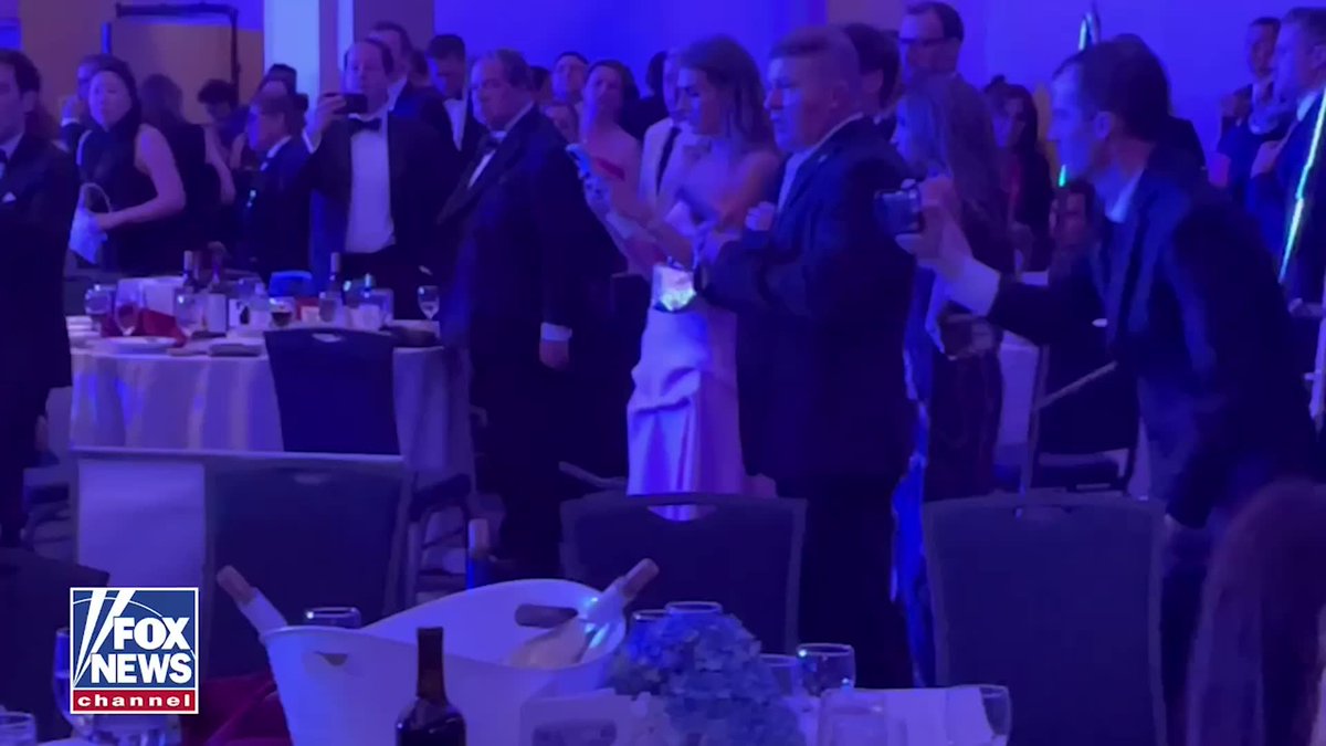 House Minority Whip Tom Emmer can be seen being rushed out of the White House Correspondents’ Dinner by his security detail.