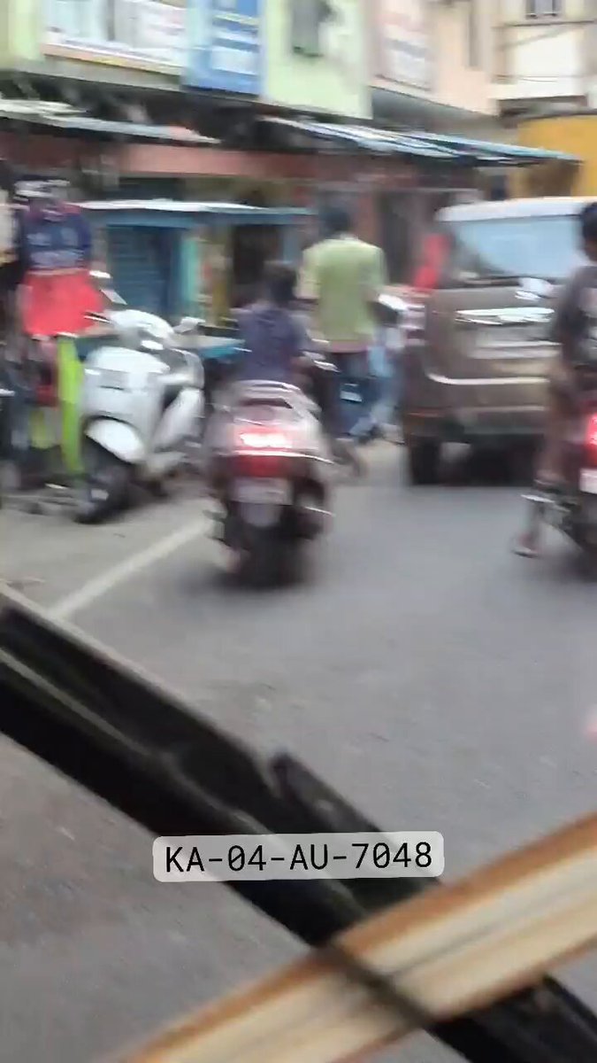📍Bengaluru, Karnataka: A young child, estimated to be under 10 years old, was seen riding a two-wheeler on a busy public road while struggling to control the vehicle. Allowing minors to operate vehicles puts lives at serious risk and reflects clear negligence by guardians. Reminder from Deadly Kalesh for public safety & road awareness.