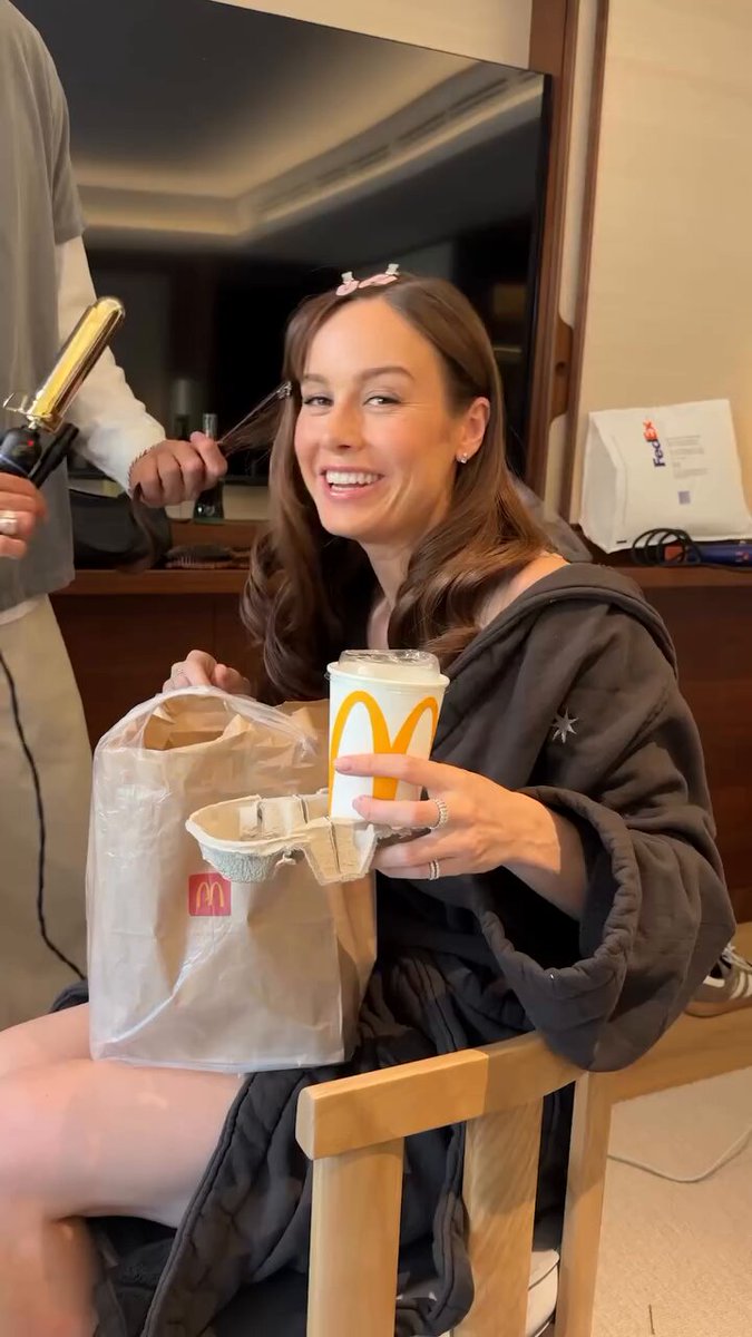 Yes, mommy Brie films a junk food review in just a robe, how can't you love this woman?