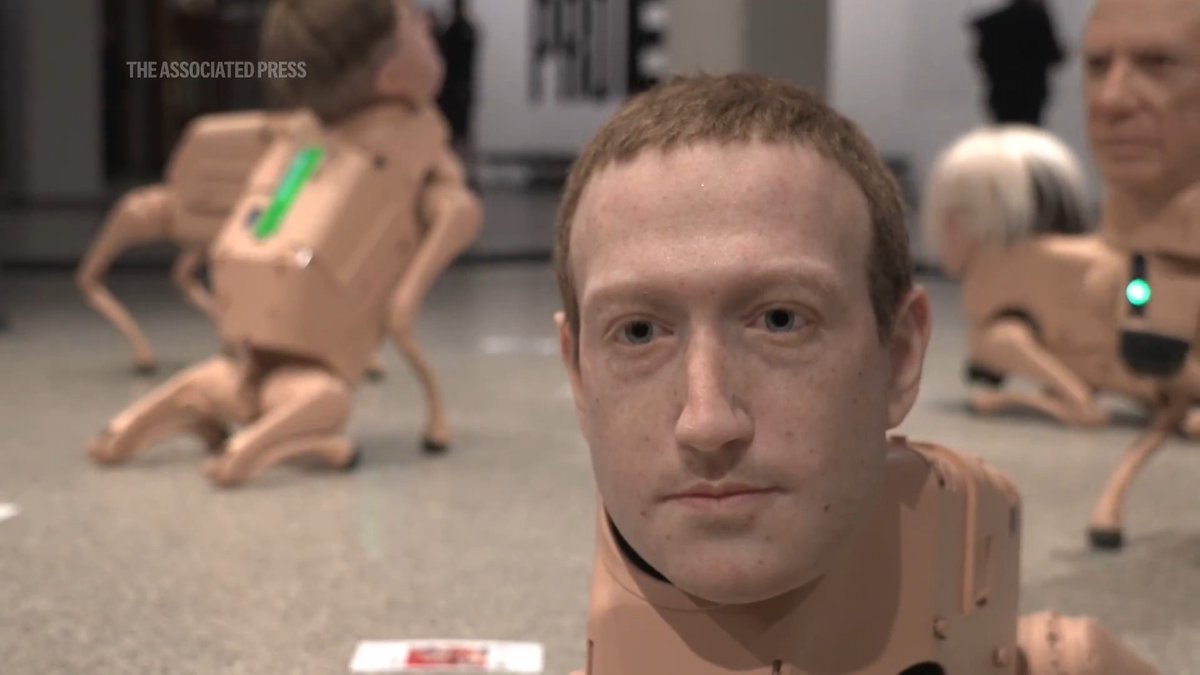 Robot dogs with hyper-realistic silicone heads modeled after Elon Musk, Mark Zuckerberg, Jeff Bezos, Kim Jong Un and other global figures roam around a Berlin museum in an exhibit by American artist Beeple. Read more: