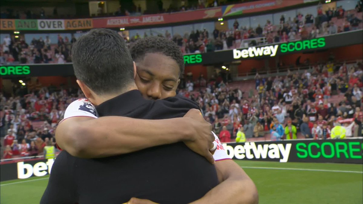 "What was you saying? I better play Tuesday!" 😂 Myles Lewis-Skelly on his big hug with Mikel Arteta at full-time 🥺