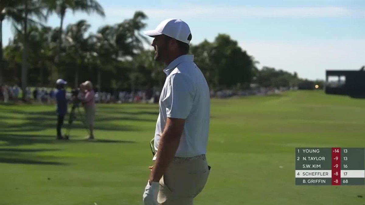 SCOTTIE GOES RIGHT AT THE FLAG ON 18.