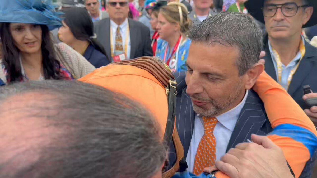 All love as Repole Stable consoles a very emotional Iradortiz after Renegade runs second in the Kentucky Derby.