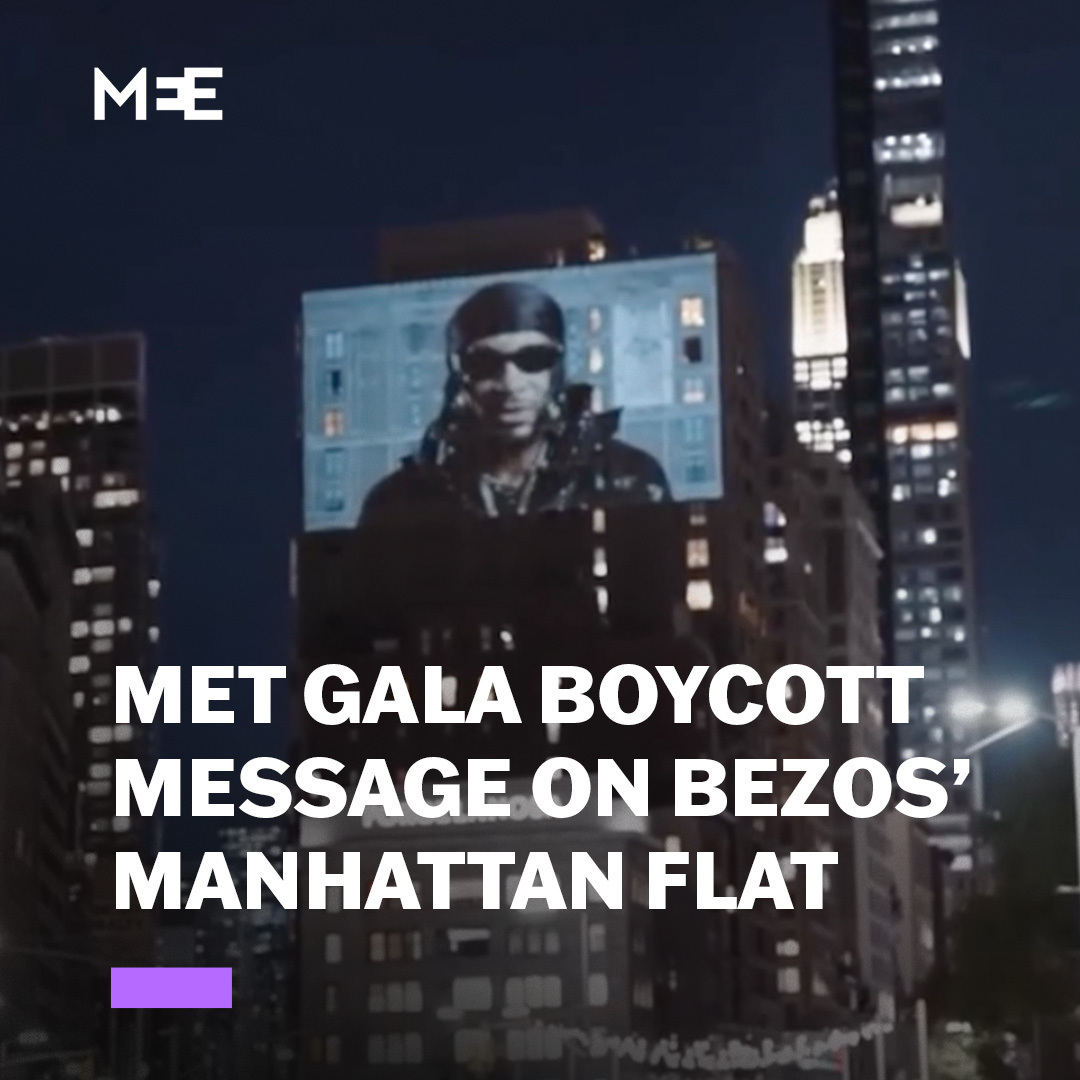 Video messages were projected on Jeff Bezos’ New York house on the eve of the Met Gala, condemning Amazon’s complicity in the Gaza genocide and ICE raids. The messages are part of a campaign calling for the Met Gala's boycott after it named Bezos and his wife as honorary chairs.