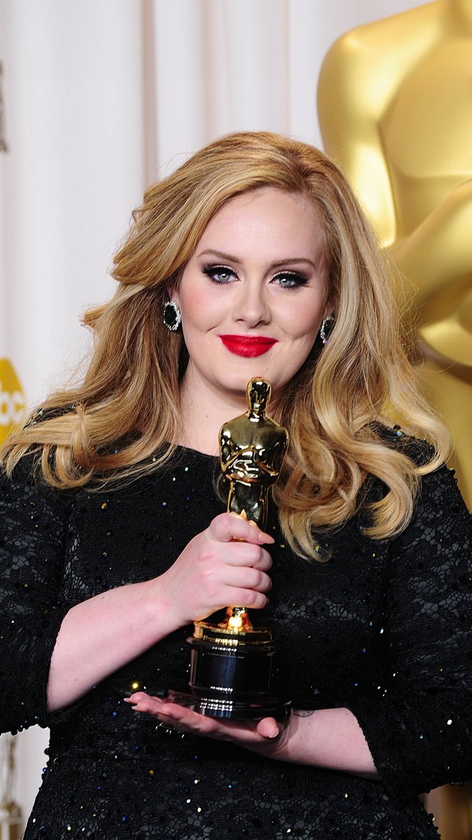 Adele and Paul Epworth accepting the Oscar for Best Original Song for the timeless and epic Bond anthem “Skyfall” from SKYFALL (2012).