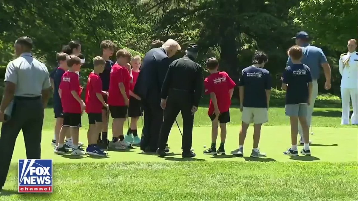 NOW: President Trump putts on the green with Bryson DeChambeau and children at the White House after reinstating the Presidential Fitness Test for students across the country.