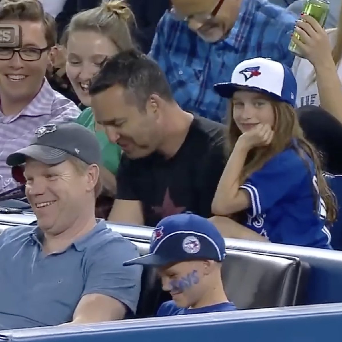 Kid gets a baseball at an MLB game and immediately decides to give it to the girl sitting behind him