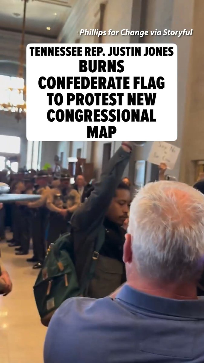 TN State Rep. Justin Jones burns a Confederate flag to protest Tennessee Republicans approving a new Congressional map Thursday -- the new map splits up a majority-Black district in Memphis.
