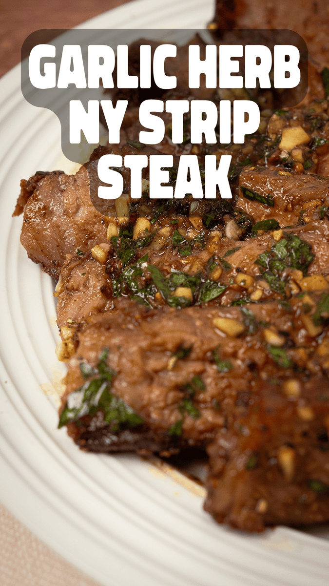 Garlic herb butter on a Dan-O-fied NY strip steak! 🥩🔥 Flavor that’ll slap ya taste buds!