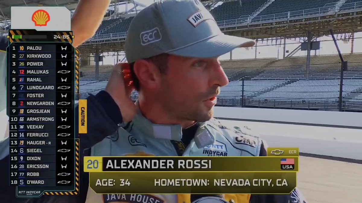 A frustrated Alexander Rossi talks with Georgia Henneberry.