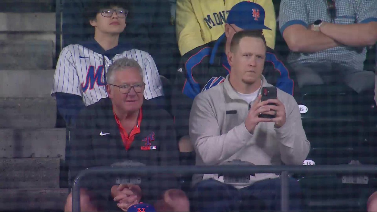 A.J. Ewing's father Joe reacts as A.J. flies out to the warning track