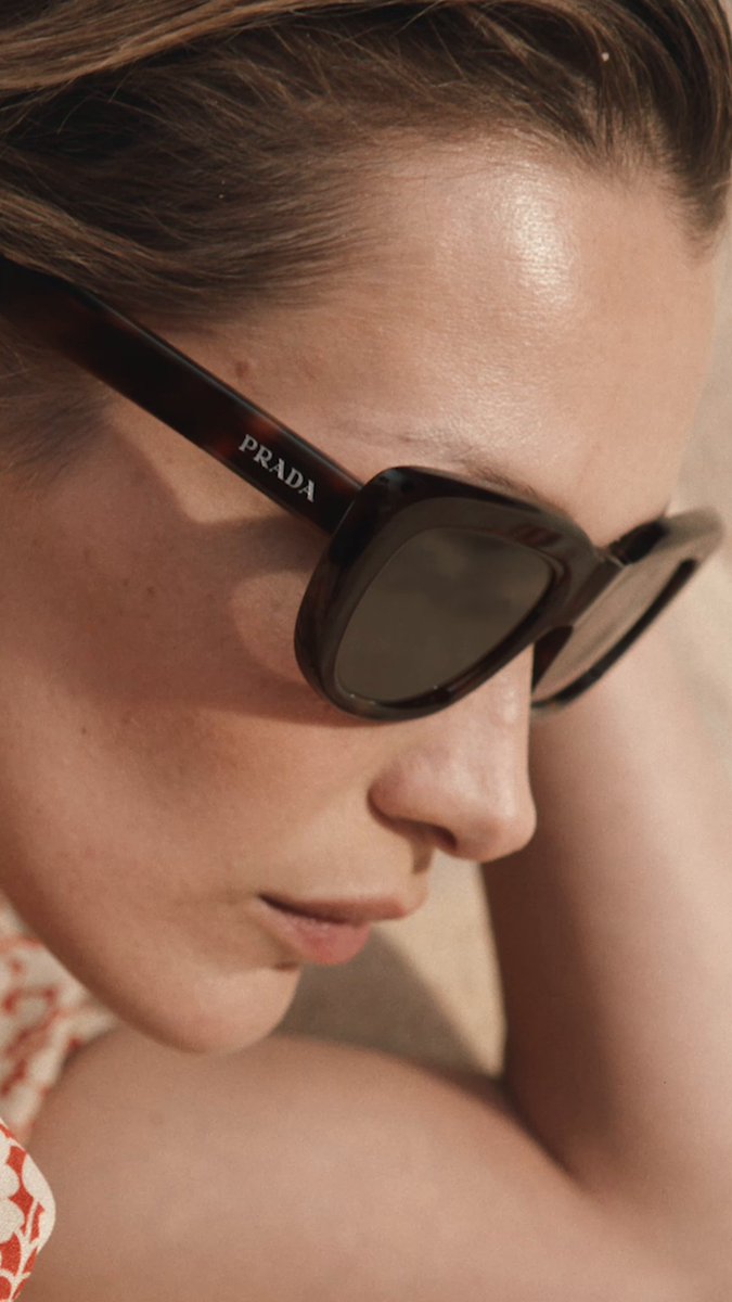 Bella Hadid in the Prada Days of Summer 2026 campaign. Prada eyewear. Between city and beach. Discover “Urban Beaches”: Creative Directors: #MiucciaPrada and #RafSimons Campaign Creative Direction: #FerdinandoVerderi Cast: #BellaHadid #PradaSummer #PradaEyewear #Prada