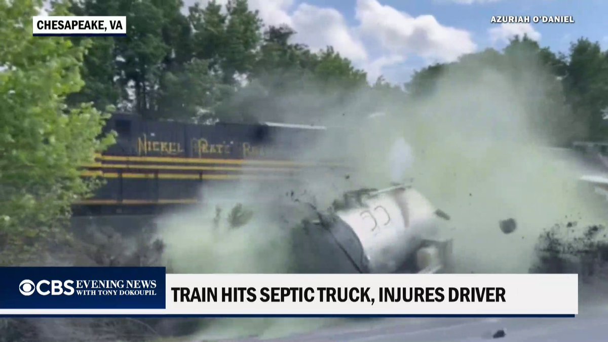 A freight train slammed into a septic truck in Chesapeake, Virginia, sending the vehicle flying and spilling sewage across the roadway. The driver was injured.