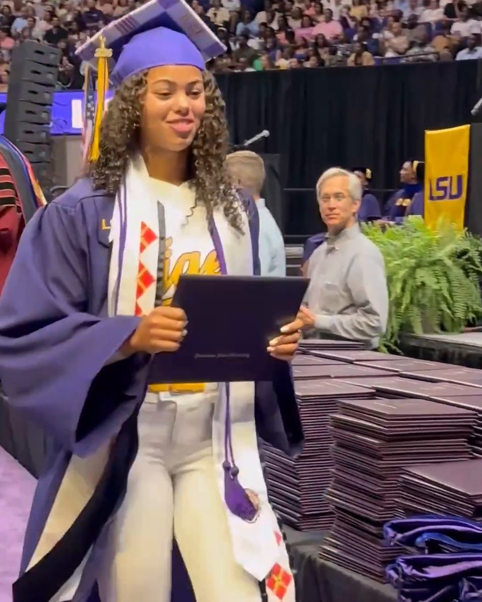 LSU's Jalia Lassiter walked at graduation while wearing her full softball uniform. She got her degree, then went right to the ballpark for LSU's NCAA regional game.
