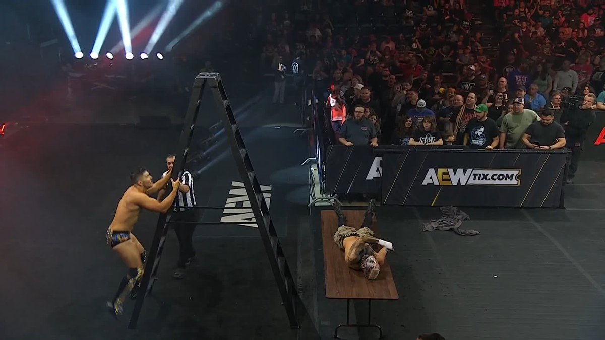 HIGH RISK, DIRECT HIT! Sammy Guevara comes flying off the ladder and crashes through DARBY ALLIN and the table! Watch #AEWCollision LIVE on TNT + HBO Max