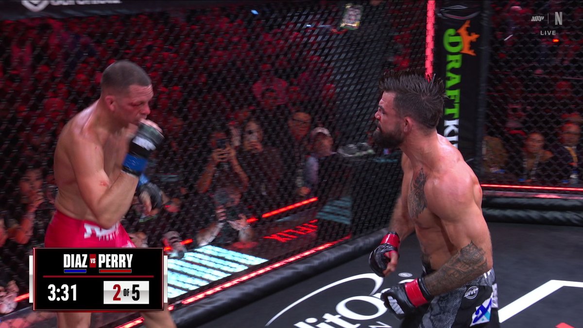 MIKE PERRY IS PUTTING IT ON NATE DIAZ IN ROUND 2. THIS FIGHT ๐ฅ๐ฅ๐ฅ #RouseyCarano is LIVE now only on Netflix!