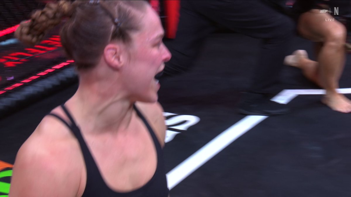JUST LIKE THAT. RONDA ROUSEY DEFEATS GINA CARANO VIA ARMBAR IN LESS THAN 20 SECONDS. #RouseyCarano