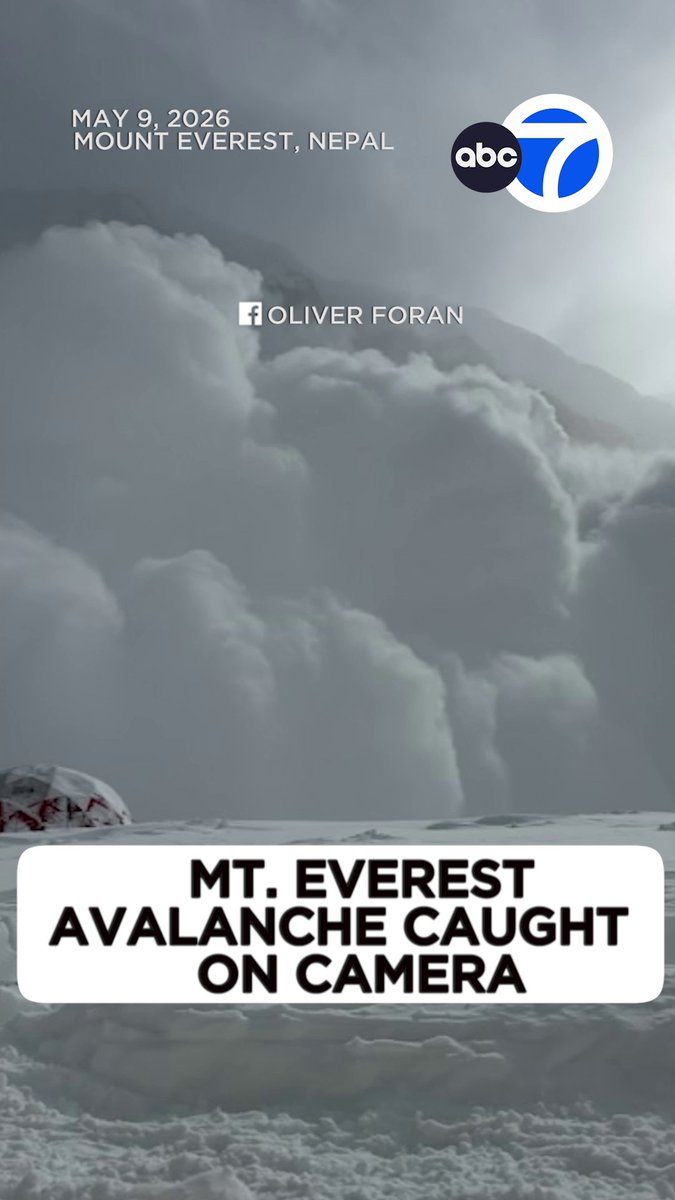 Incredible footage shows the dramatic moment a hiker captured an avalanche on Mount Everest — with the group quickly zipping up their tent as the wall of snow approached.