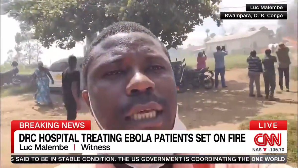 BREAKING: Angry locals tried to forcibly take the body of man believed to have died of Ebola in northeastern DRC. 2 tents treating patients were set on fire. Some believe that Ebola is a "white man's disease" though it often spreads at funerals. Uganda has suspended DRC flights