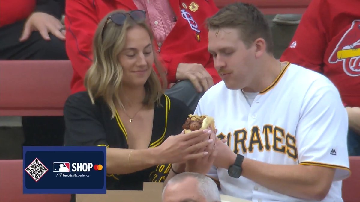 Love is sharing a chili dog while rooting for your team at an away game ❤️