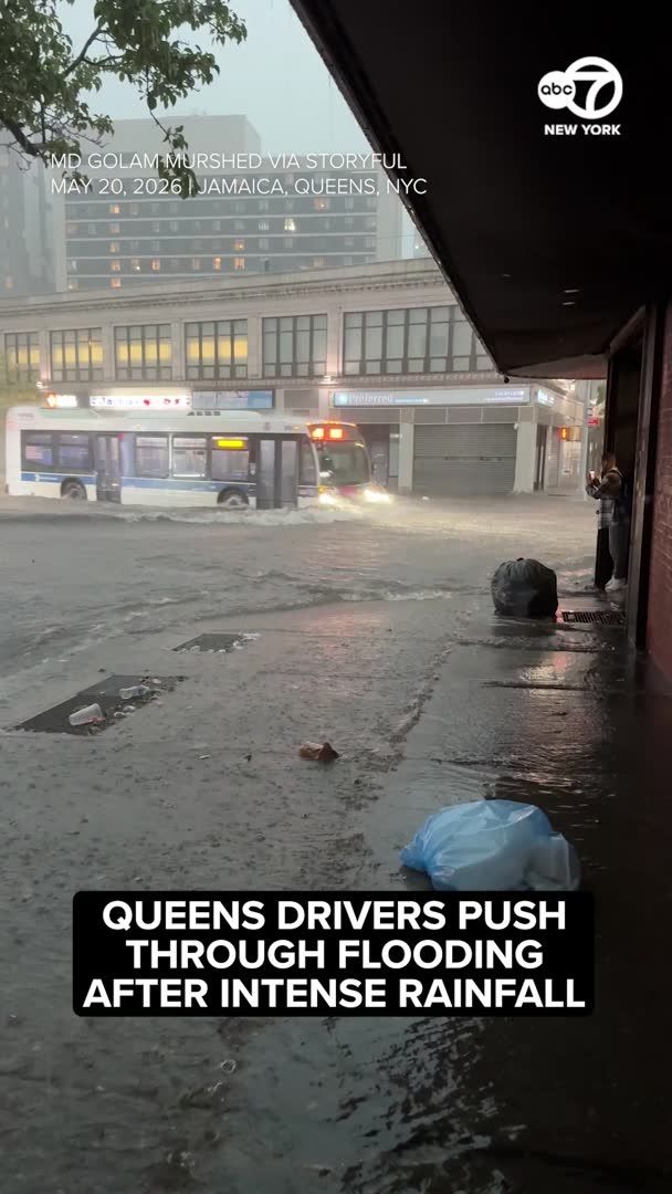 Cars, even fire trucks and MTA buses, were seen navigating flood waters in Jamaica, Queens, on Wednesday night as heavy rain from a storm triggered flash flooding. More: