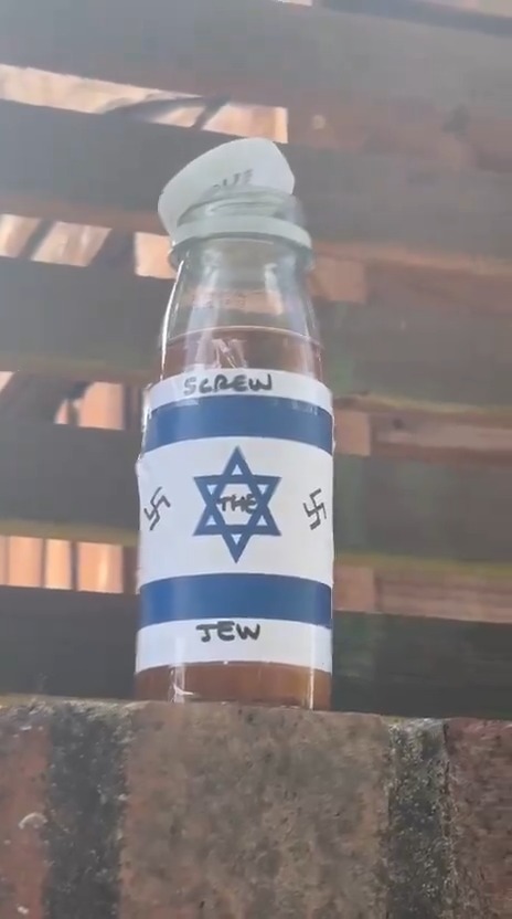 A bottle filled with an unknown liquid was found in North London with a handmade wrapper that reads "Screw the Jew" in the style of the Israeli flag. It's also covered in swastikas. What happened to being normal?