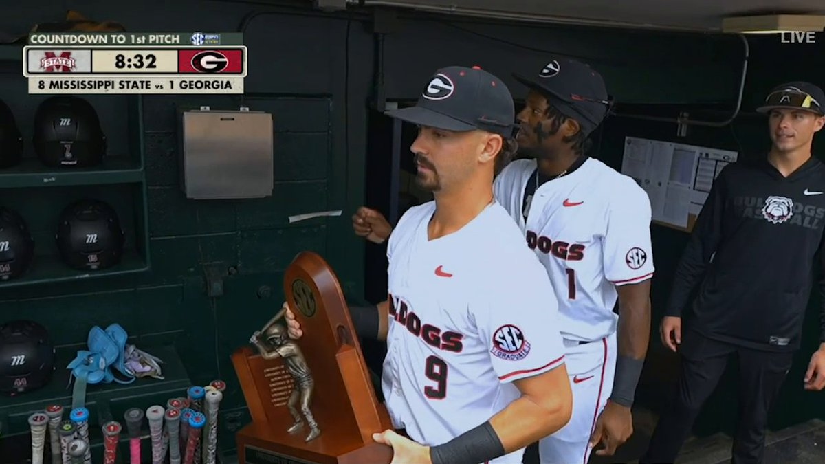 Kolby Branch brought the trophy into the dugout so everyone could celebrate 🏆 W teammate 👏 Georgia Baseball