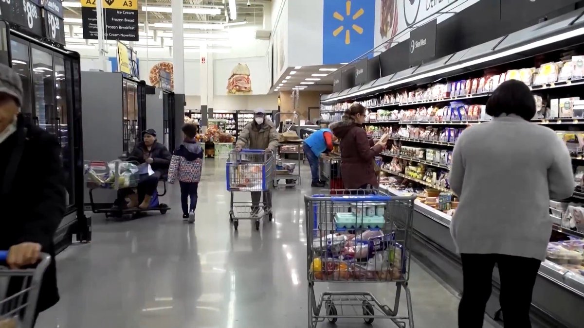 WATCH: Walmart stuck to its conservative annual sales and profit targets, driving shares down even as rising fuel costs drove bargain-hunting shoppers to its low-priced groceries and essentials